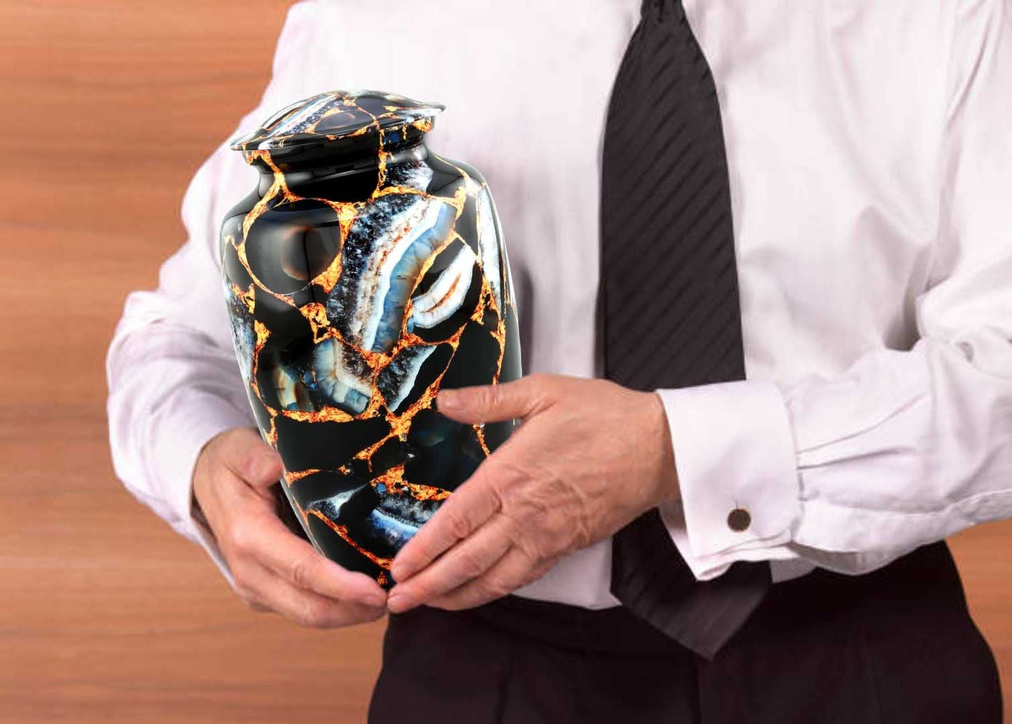 A man holding Marble Finish Keepsake Cremation Urn