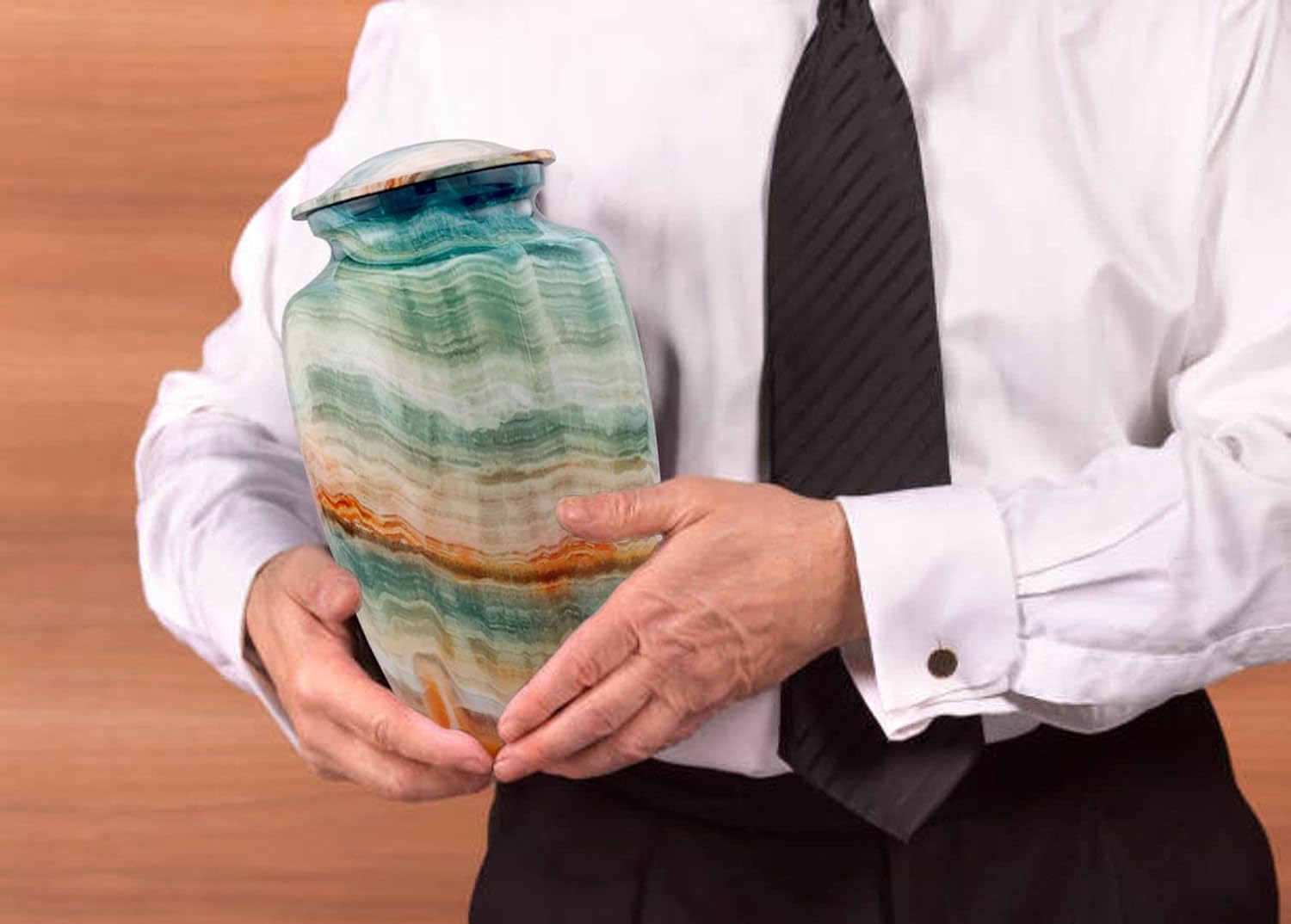 A Man holding in hand Keepsake Urn 