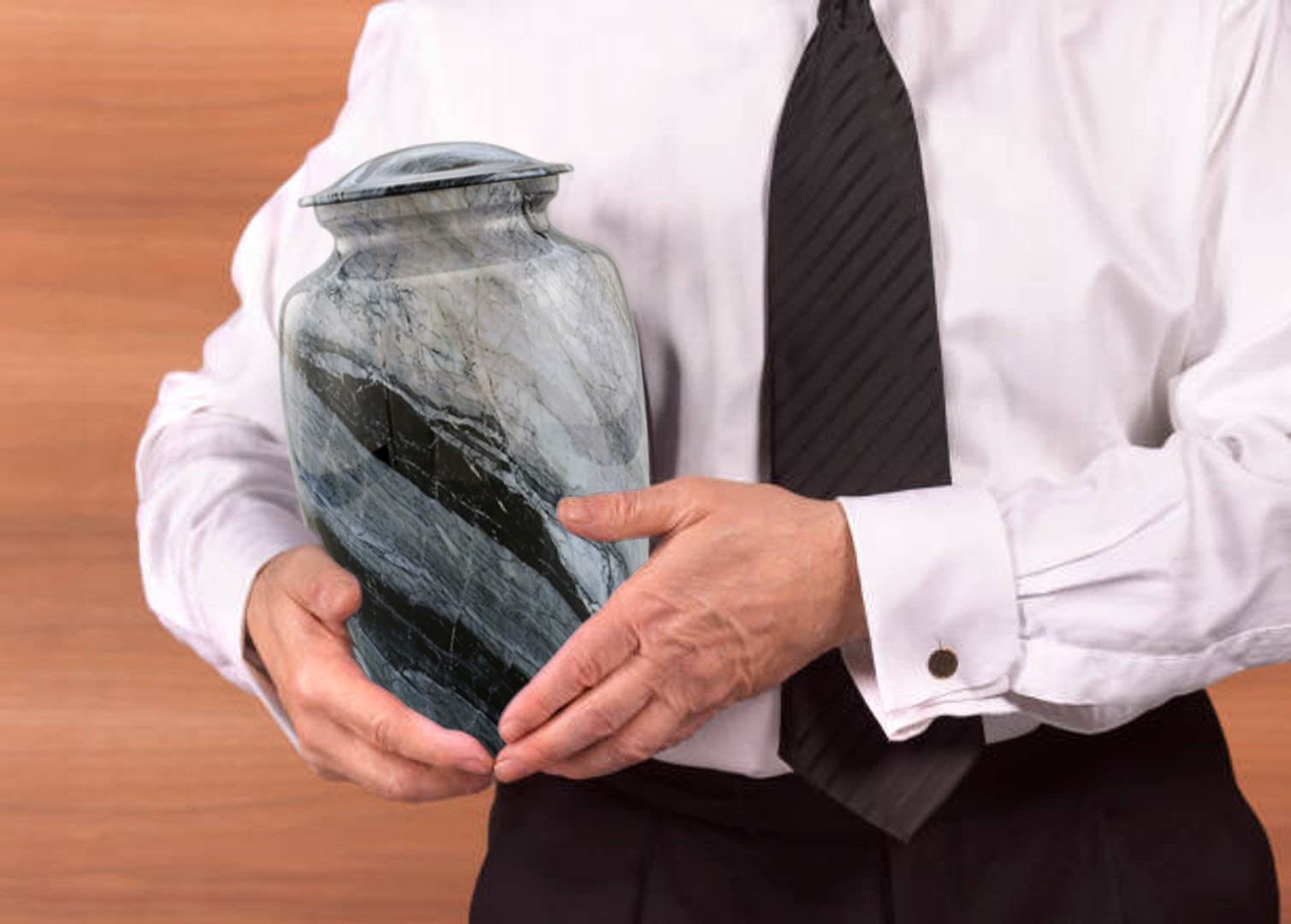 Man holding hancrafted Keepsake Urn 