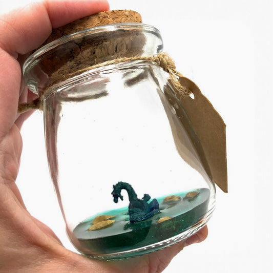 1 Inch Loch Ness Monster Desk Pet Nessie in Glass Jar with Collected in Scotland Tag